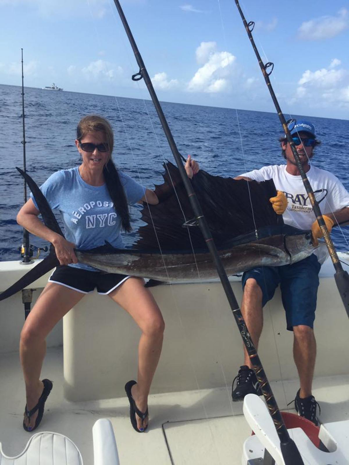a group of people on a boat in the water